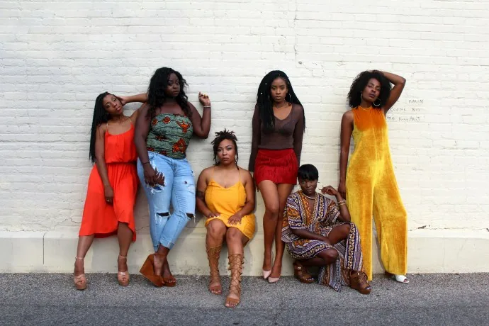 A group of women meet together.